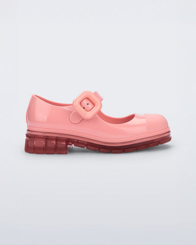 Side view of a pink June mary jane with matte toe cap