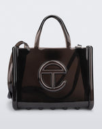 Front view of a black medium Melissa Jelly Shopper bag + Telfar bag with a handle and straps.
