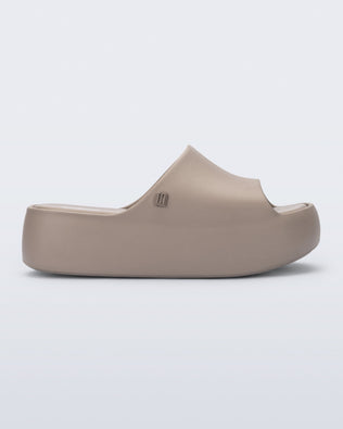 Product element, title Free Platform Slide in Dark Beige
 price €99,00