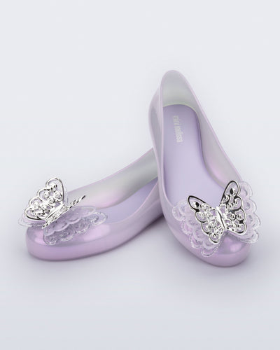Angled view of a pair of purple Sweet Love Butterfly kids flats.
