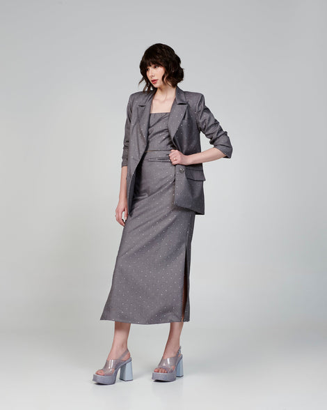 Model in a grey dress wearing a pair of clear glitter Dance Heel platforms
