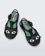 Top view of a pair of black baby Possession Cat sandals
