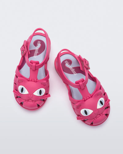 Top view of a pair of pink baby Possession Cat sandals