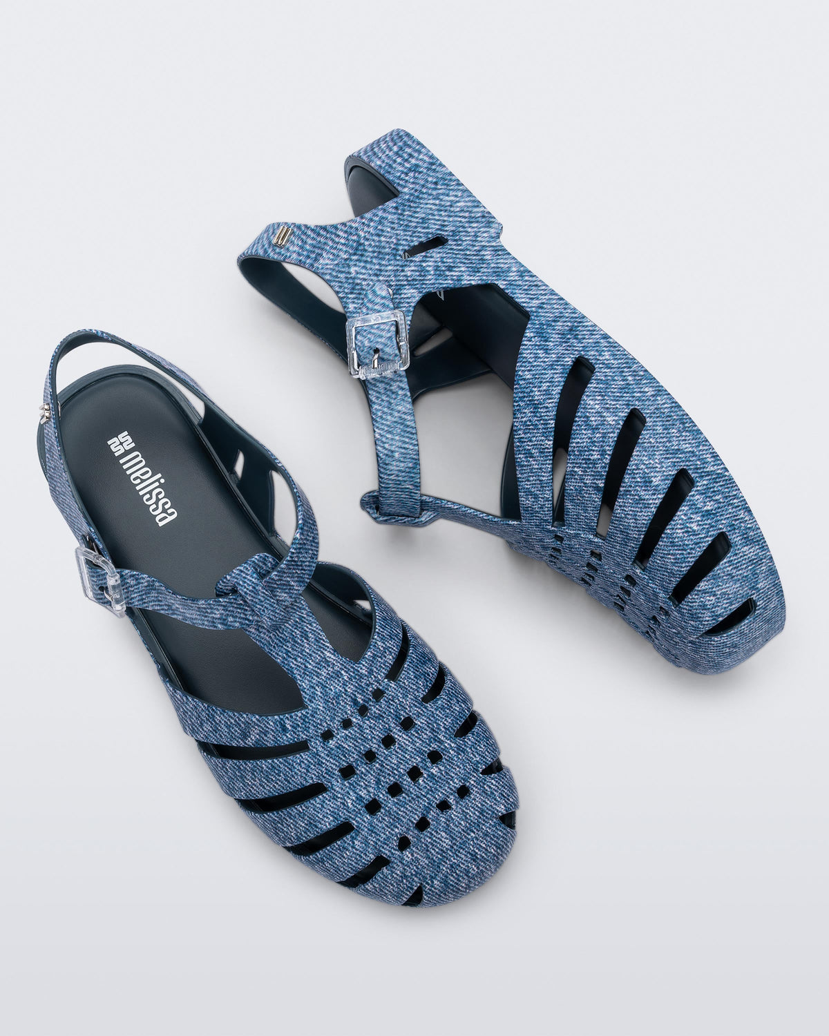 Top and side view of a pair of blue jean Possession sandals