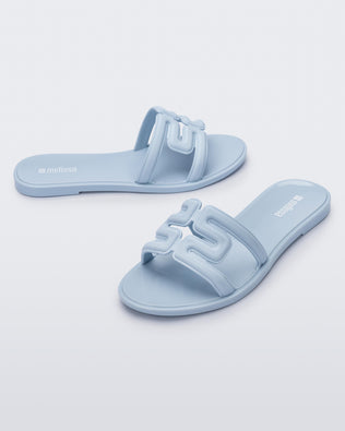 Product element, title M Slide in Light Blue
 price €34,30