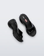 Top and side view of a pair of black Platforms + Diesel slides