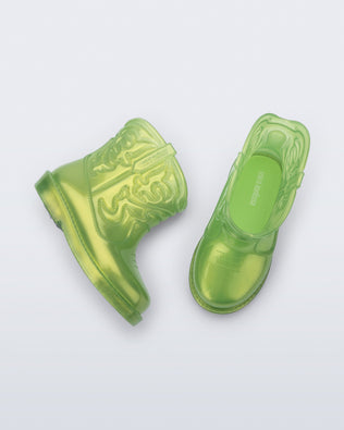 Top and side view of a pair of pearly green Texas baby boots