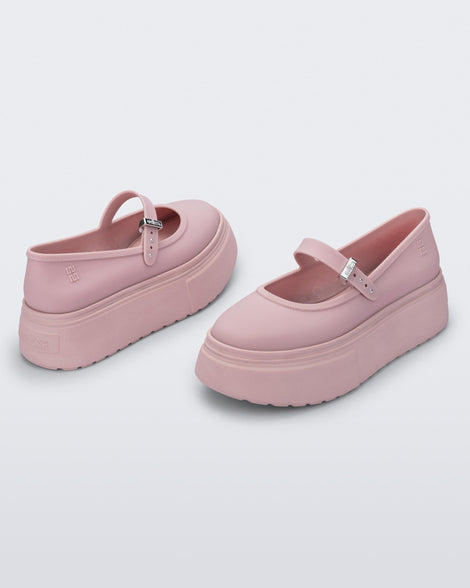 Back and angled view of a pair of pink Soft Ballerina Platform flats