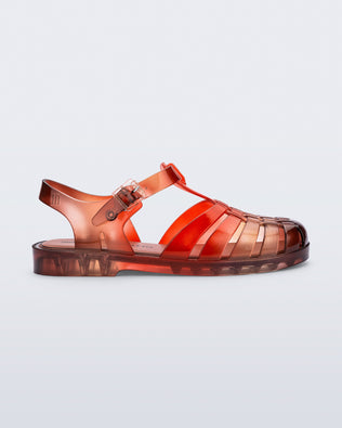 Side view of a transparent red Possession + Nodaleto fisherman sandal