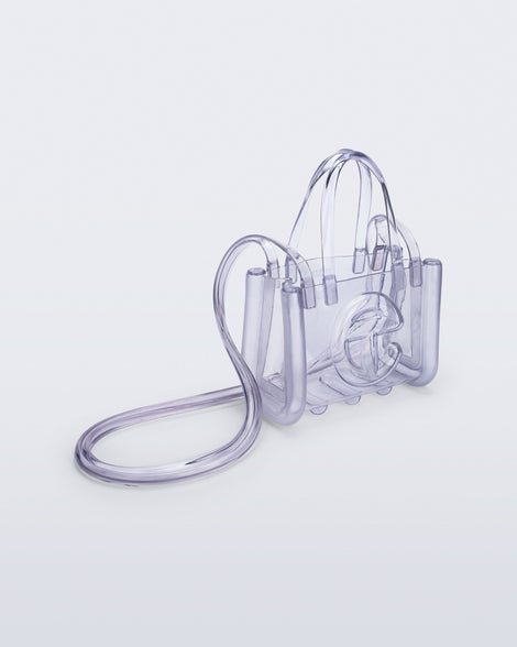 Angled view of the clear Small Jelly Shopper x Telfar bag
