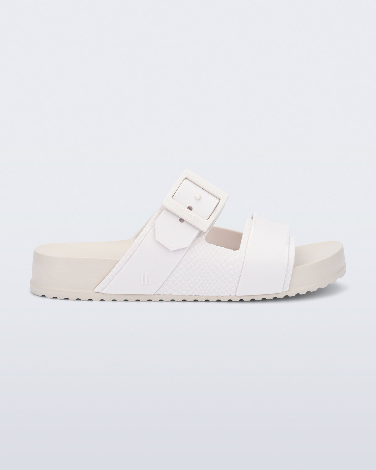 Side view of a white Cozy Connection slide