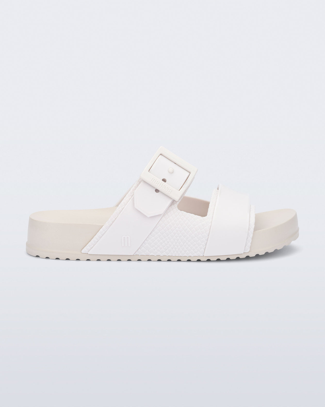Side view of a white Cozy Connection slide