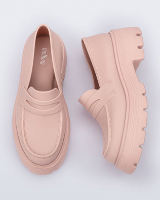 Top and side view of a pair of matte red Royal adult loafers