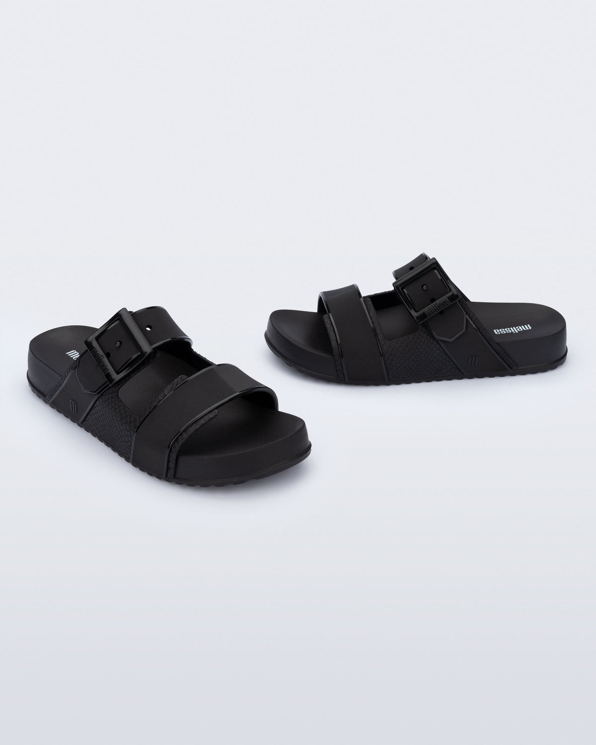 Angled view of a pair of black Cozy Connection slides