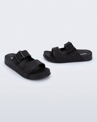 Product element, title Cozy Connection Slide in Black
 price €56,00