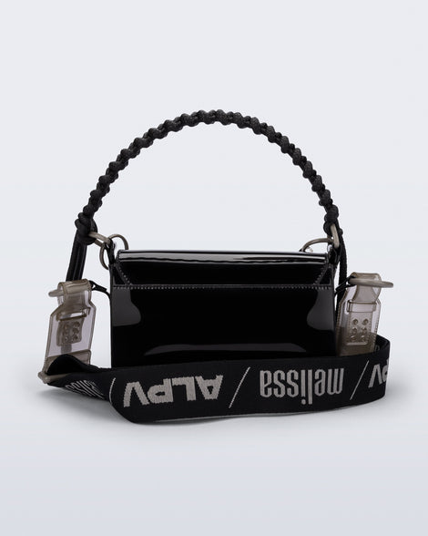 Back view of an black Olga Bag + Alexandre Pavao with short strap fabric long  strap