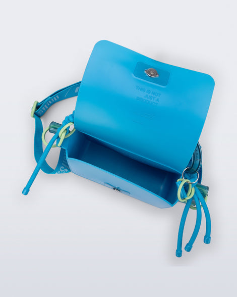 Top view of an blue Olga Bag + Alexandre Pavao with short strap fabric long  strap