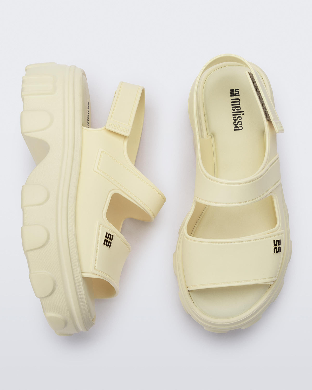 Top and side view of a pair of Ella Move platform sandals.