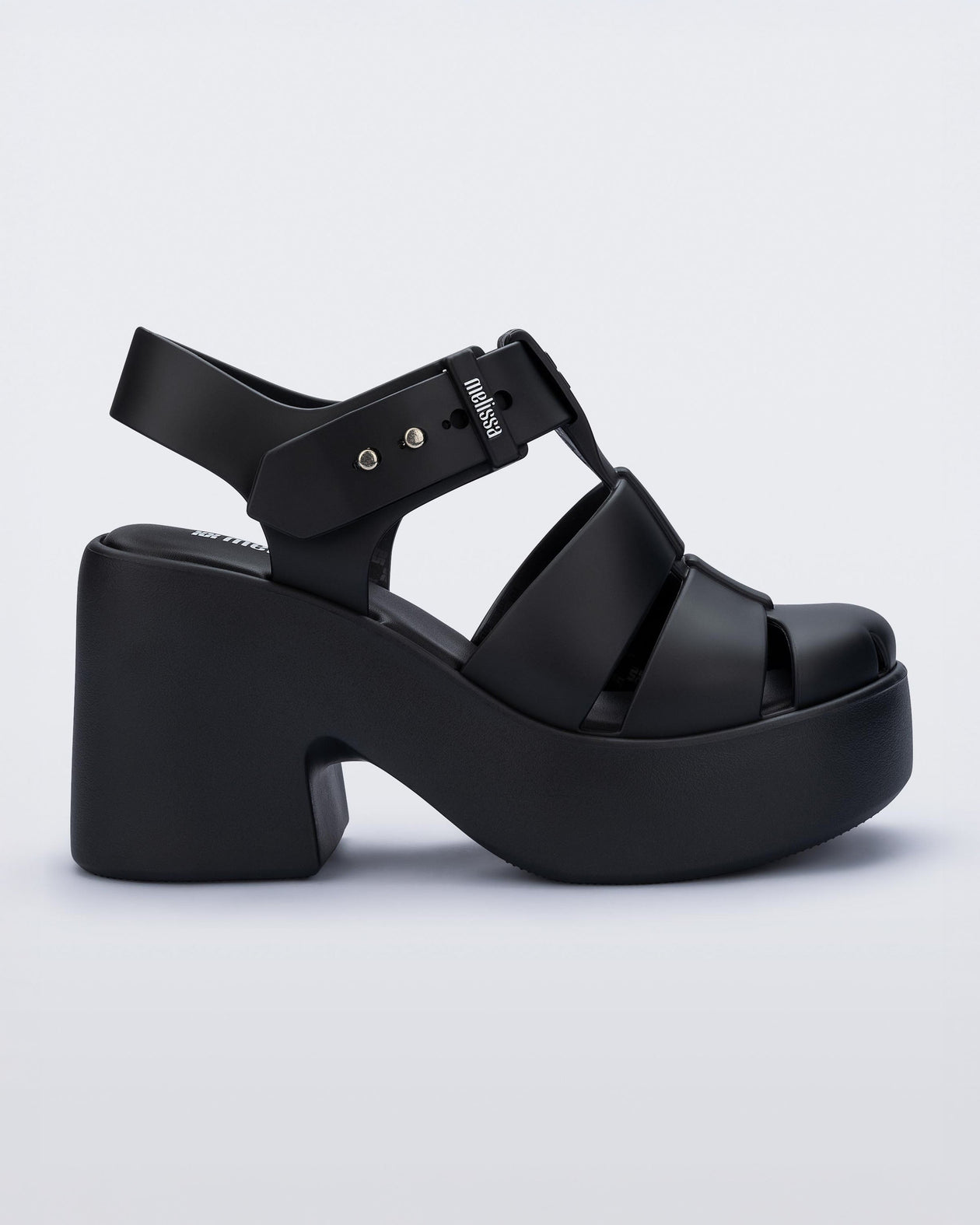 Side view of a matte black Lulu platform heel sandal
