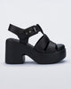 Side view of a matte black Lulu platform heel sandal