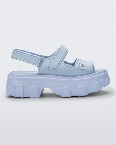 Side view of a blue Ella Move platform sandal.