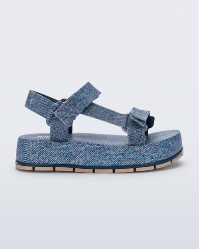 Side view of a blue jean Flowing Denim platform