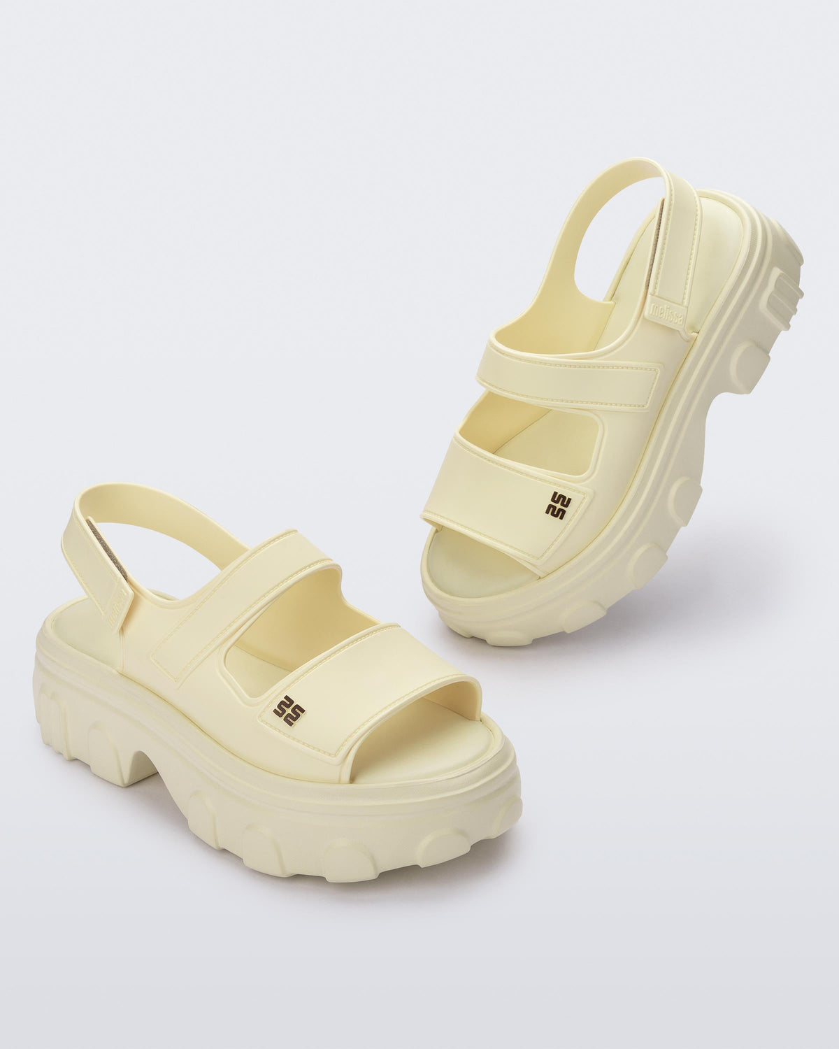 Angled view of a pair of Ella Move platform sandals.