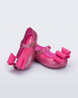 Product element, title Ultragirl Classic Bow in Glitter Pink
 price €59,00