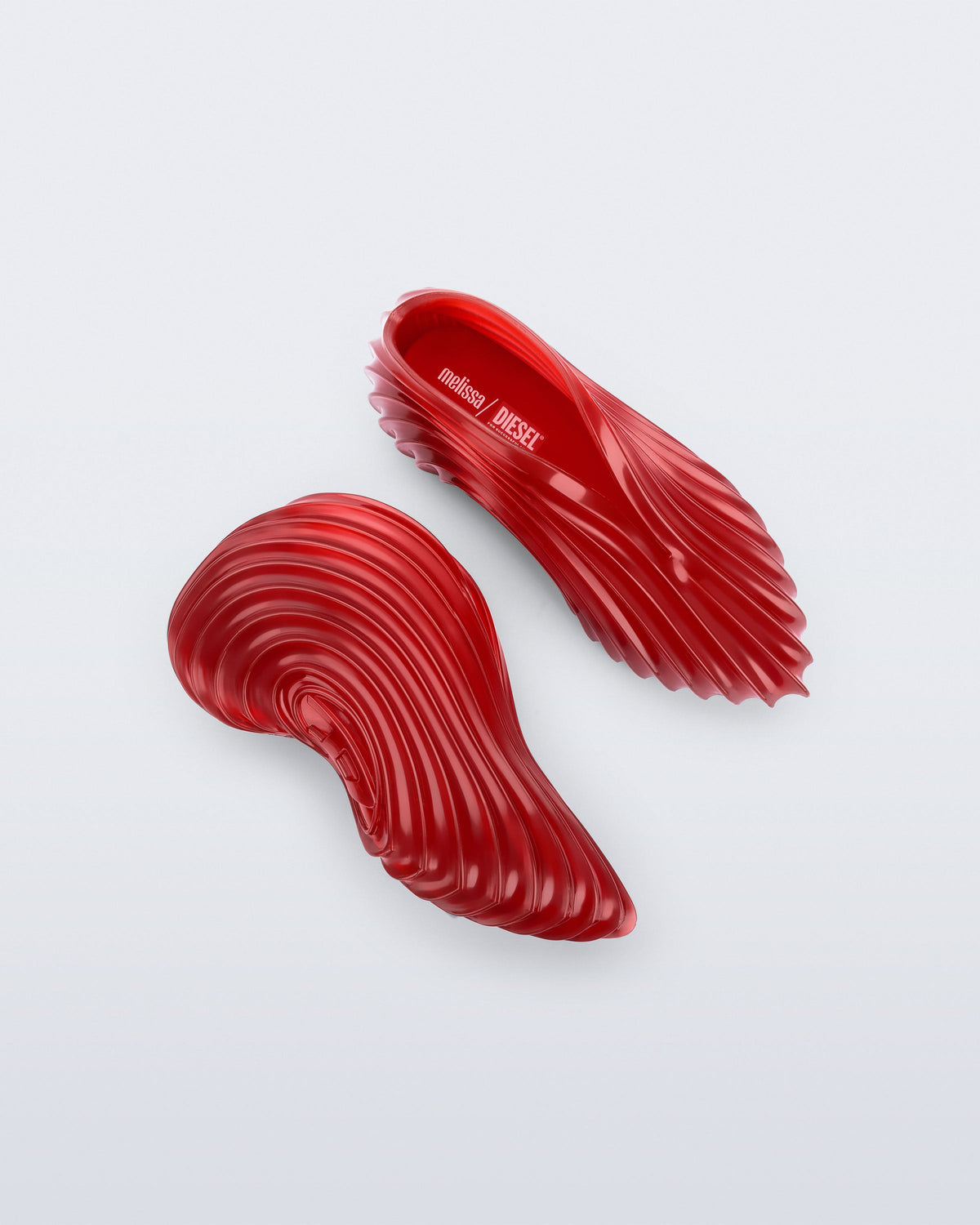 Top and side view of a transparent red Sneaker + Diesel