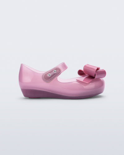 Side view of a lilac Ultragirl Classy baby ballerina with lilac bow.