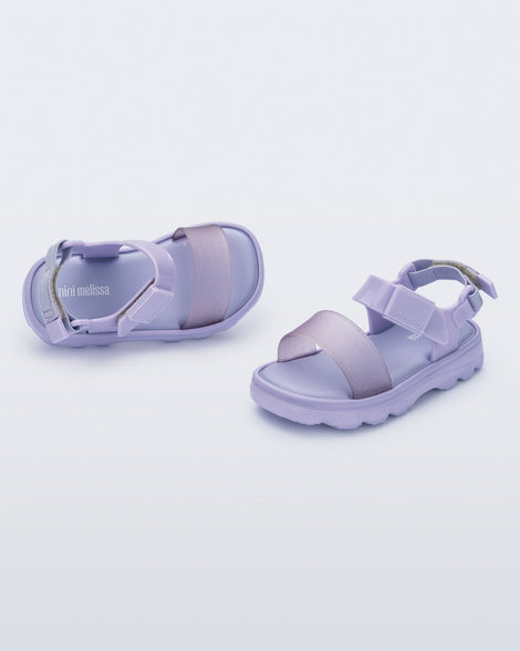 Angled view of a pair of lilac baby Kick Off Sandals