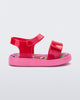 Side view of a pearly red baby Jump sandal