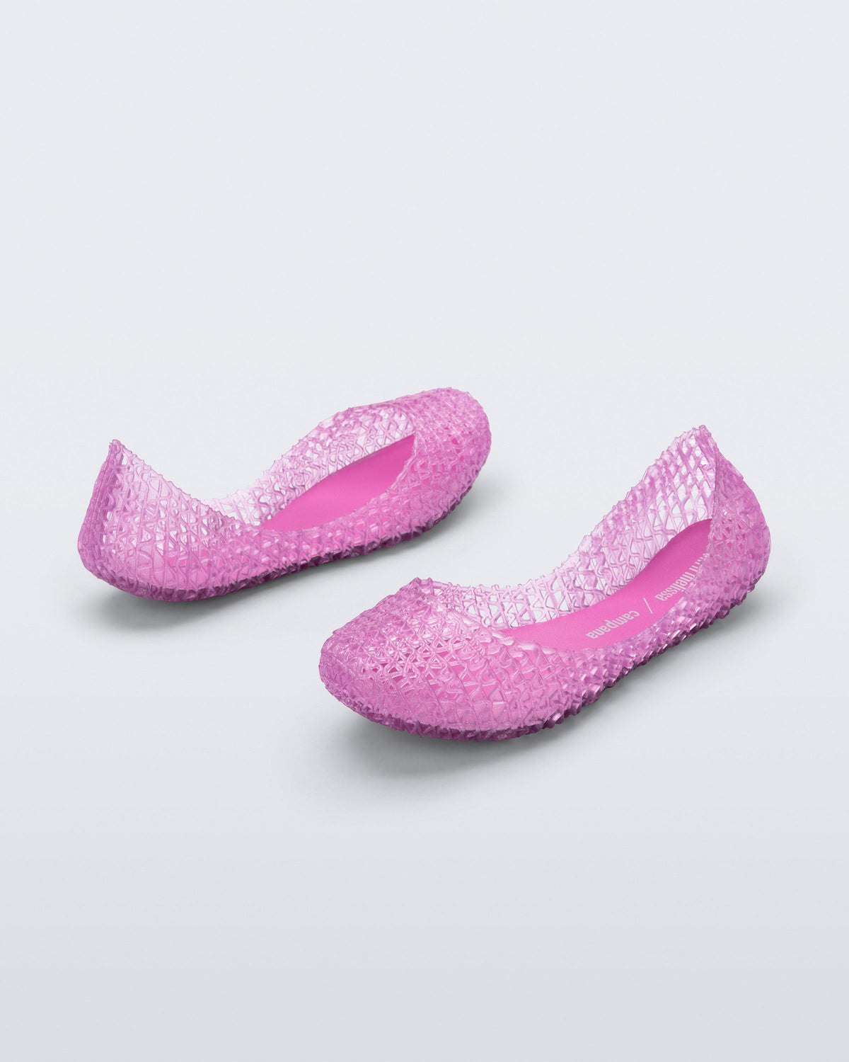 Back and front angled view of a pair of pearly pink Campana kids ballerinas