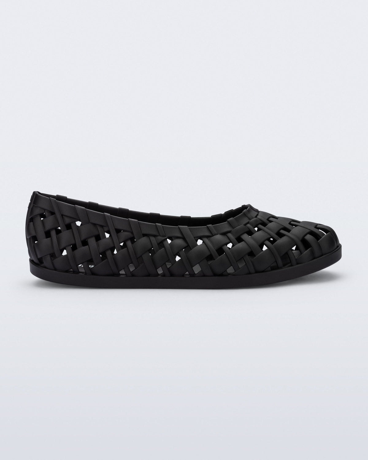 Side view of a black Possession Ballerina flat