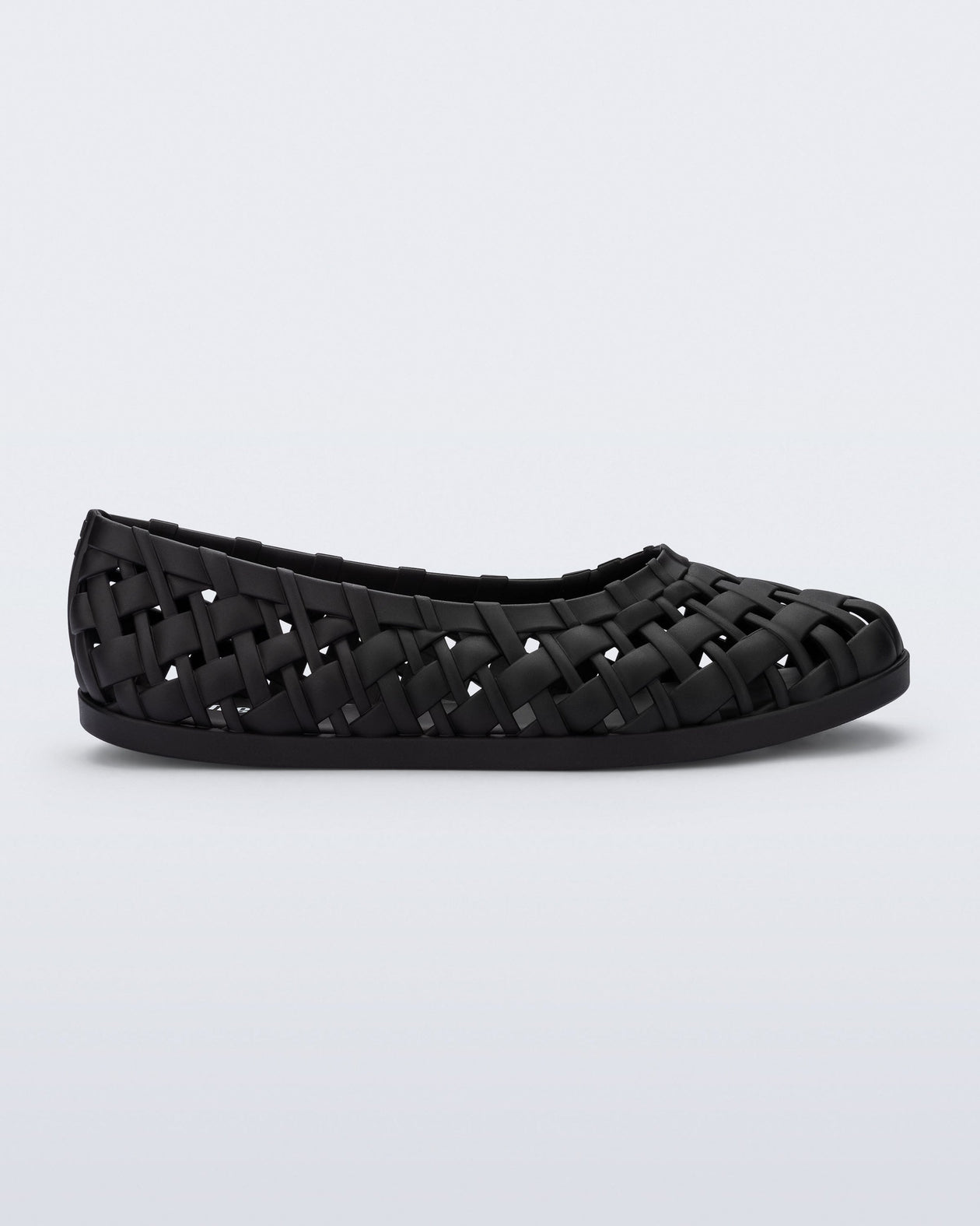 Side view of a black Possession Ballerina flat