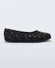 Side view of a black Possession Ballerina flat