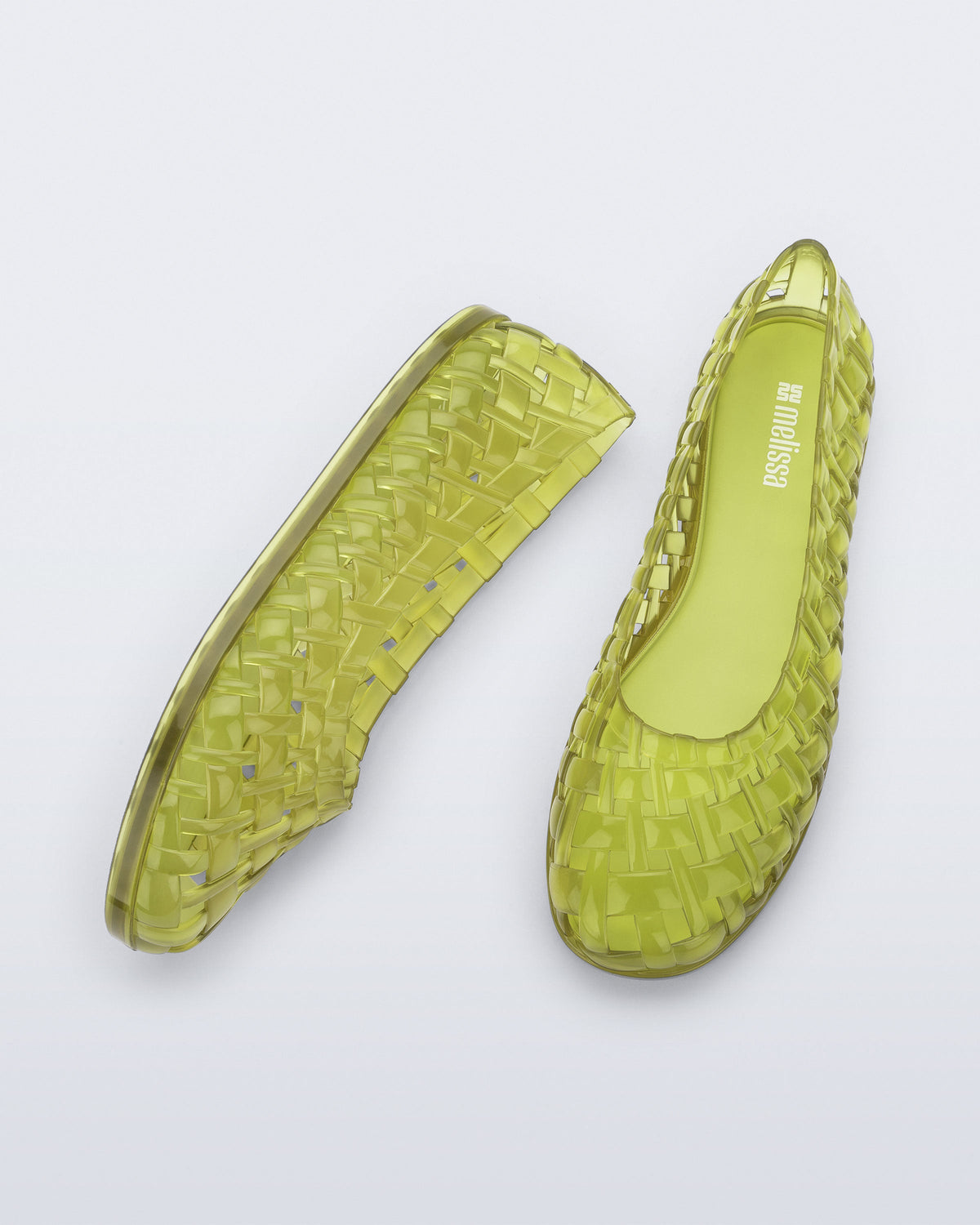 Top and side view of a pair of clear green Possession Ballerina flats