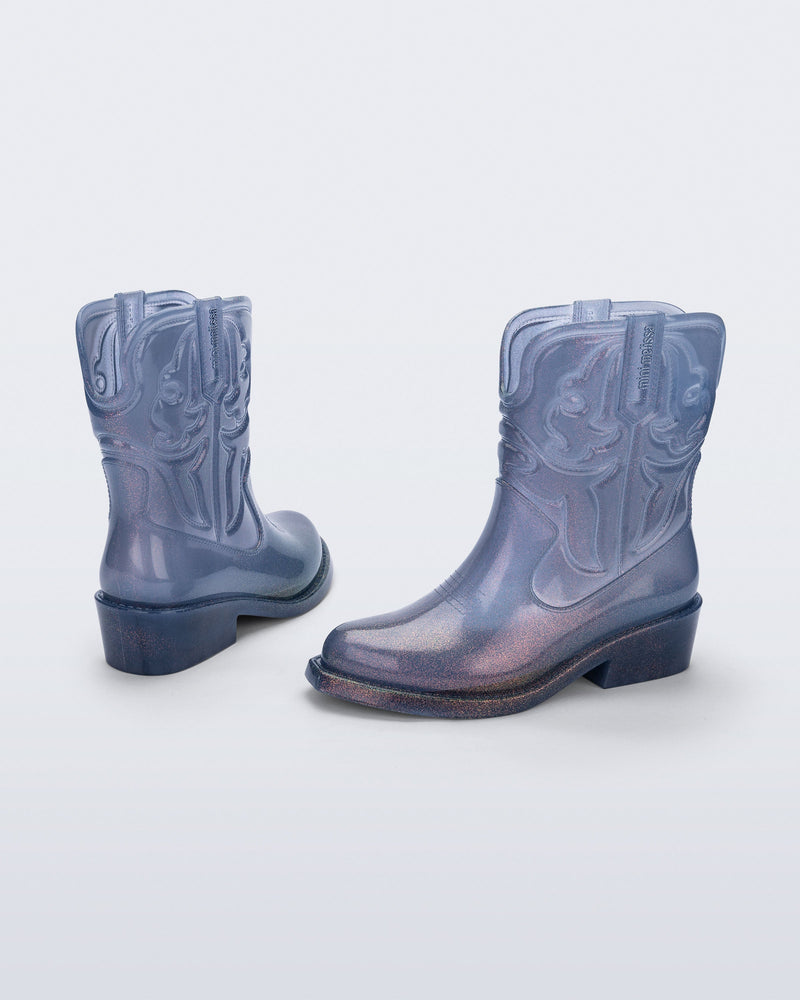 Back and side view of a pair of glitter blue Texas kids boots