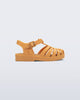 Side view of a matte caramel Possession baby fisherman sandal.