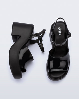 Top and side view of a pair of black Lina platform heels