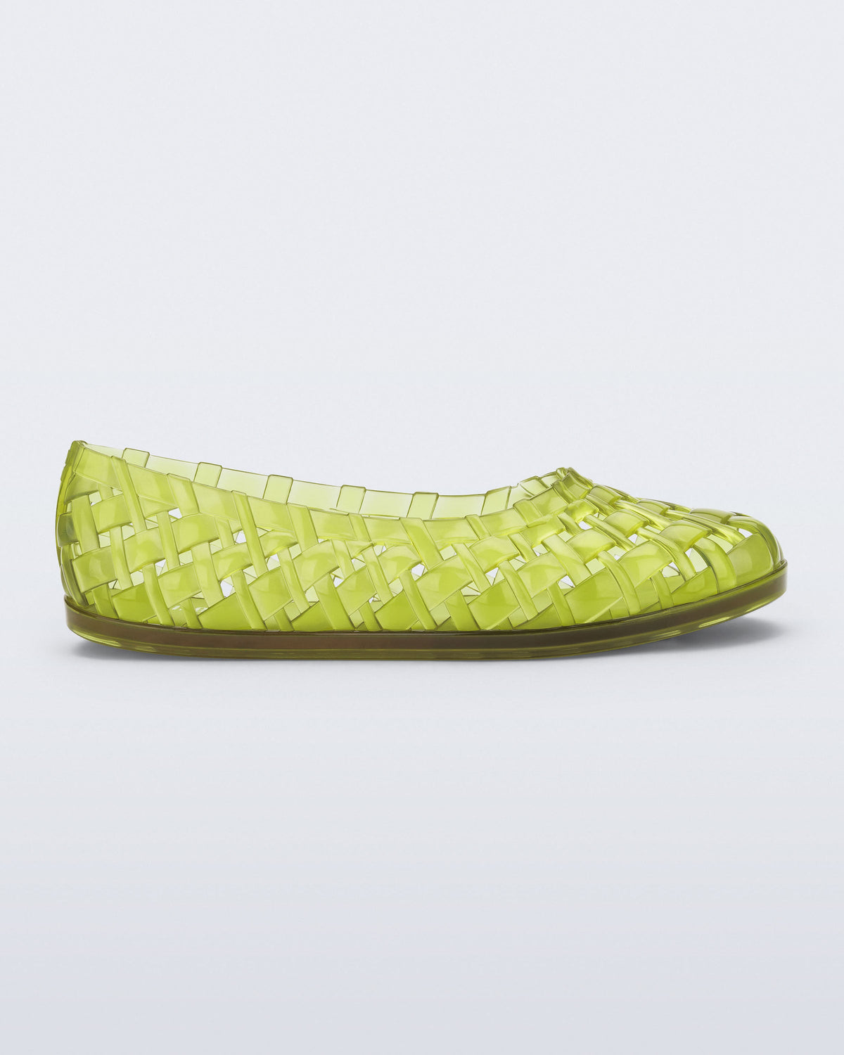 Side view of a clear green Possession Ballerina flat