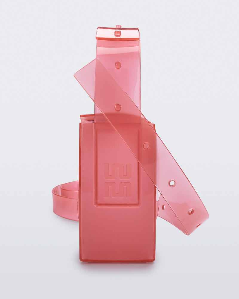Side view of a clear pink Clear Bag with strap