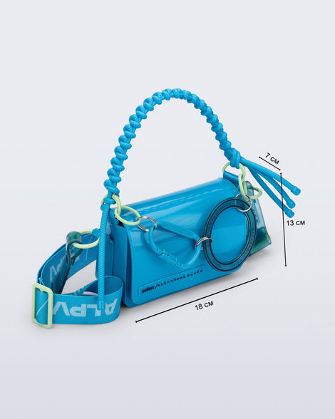 Angled view of an blue Olga Bag + Alexandre Pavao with short strap fabric long  strap. With purse dimensions of 18cm x 7cm x 13cm