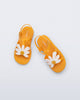 Top view of a pair of orange Hip Bloom kids sandals