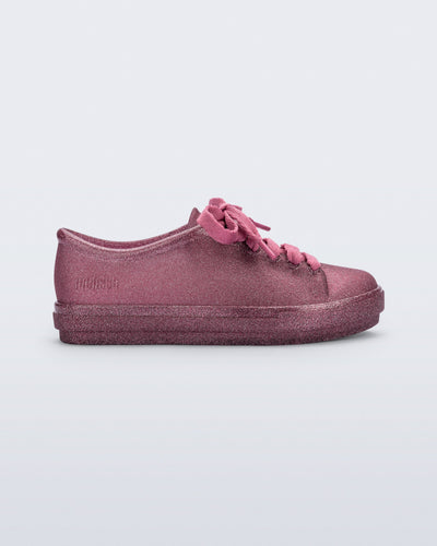 Side view of a glitter pink kids Hip Sneaker with pink laces