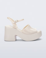 Side view of a beige Lina platform heel