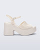 Side view of a beige Lina platform heel