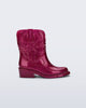 Side view of a glitter pink Texas kids boot