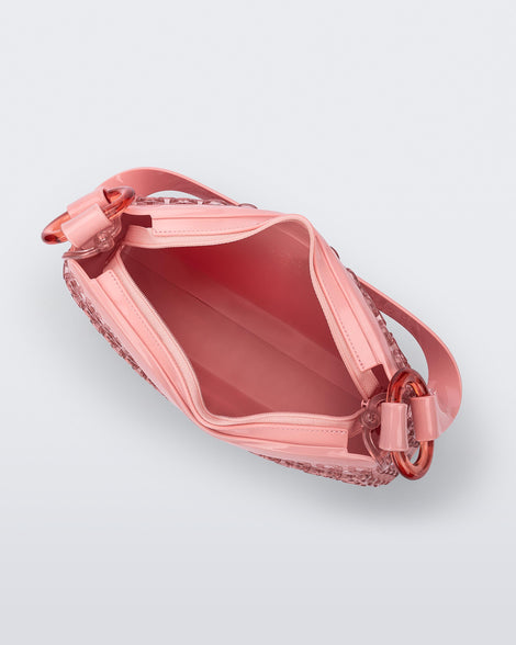 Top view of a pink Hoop bag with short shoulder strap