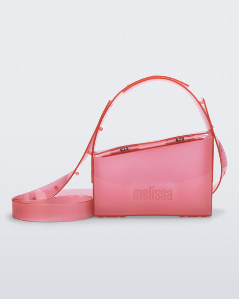 Back view of a clear pink Clear Bag with strap